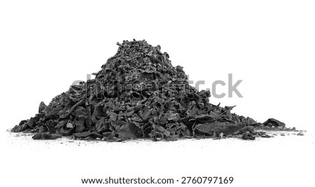 Destruction of documents - ashes from burning paper. Pile of charred paper scraps isolated on a white background.