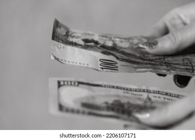 Detail Of 100 USD Banknotes Next To 100 CHF Banknotes. Detail Of United States Dollar And Swiss Franc. World Money Concept, Inflation And Economy Concept