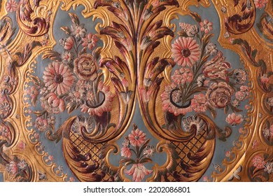 detail of 18th century rococo style gilt leather wall covering with floral pattern  - Shutterstock ID 2202086801