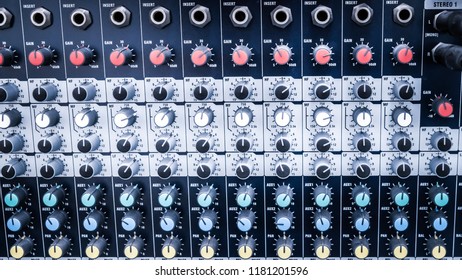 Detail with adjusting knobs on a professional audio mixer and music equipment for sound mixer control, Music engineer, Backstage.