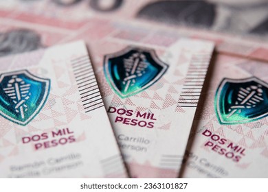 Detail of the Aesculapius' staff of 2000 Argentinean peso banknotes, close-up detail - Shutterstock ID 2363101827