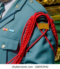 Detail of the aiguillette in the uniform of the spanish Civil Guard. Guardia Civil. Spain