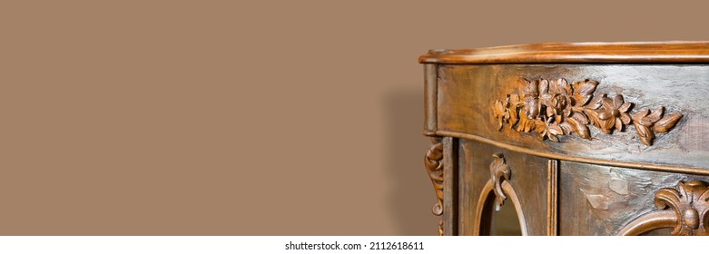 Detail of an ancient italian wooden furniture of the 19th century just restored - Web banner design concept with copy space for inserting text