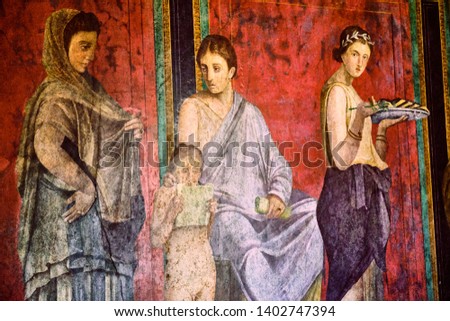detail of the ancient painting in the Villa of the Mysteries in Pompeii.