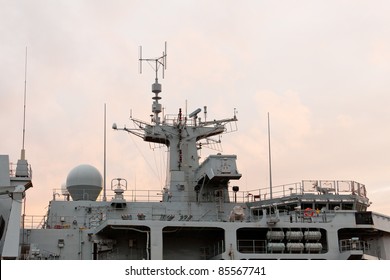 Detail Of Antenna On Warship As The Sun Sets Behind The British Navy Ship