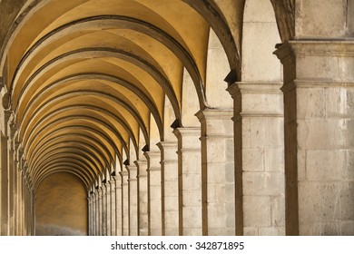 Detail of arches and ceiling of building in the ancient walled city of Lucca, Italy