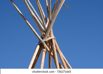 Detail Of Bare Winter Teepee Poles At End Of Camping Season 