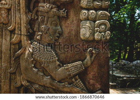 Detail of Basrelief carving of Mayan king and signs at the archaeological site of Palenque, Chiapas, Mexico