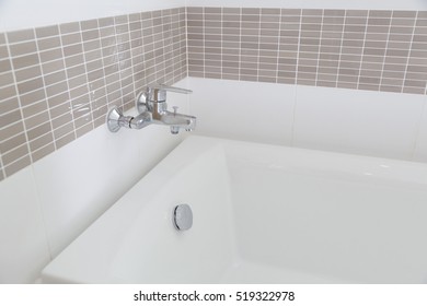 Detail of the bath tub in bathroom - Shutterstock ID 519322978