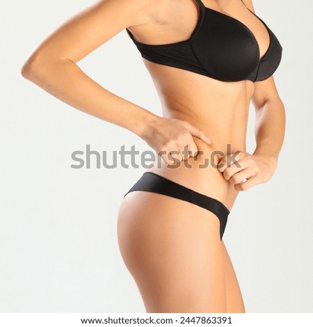 Detail of a beauty woman’s body, 
Slimming set, flat stomach, belly and waistline, adiposity and abdominal swelling, Anti-cellulite, reshaping, firming, buttocks, toned buttocks