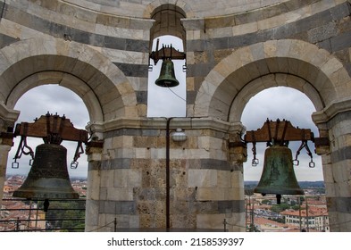 The detail of the bells of the campanile at the top of the leaning tower of Pisa, Italy
