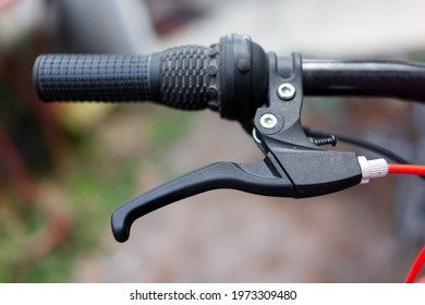 detail of bicycle brake lever handle, bicycle concept with selective focus