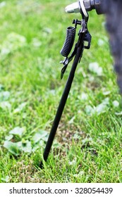 Detail Of A  Bicycle Kickstand In Outdoors.