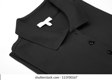 Detail Of A Black Polo Shirt.