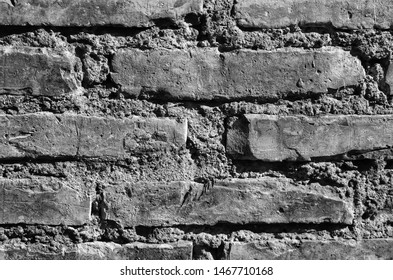 Detail of a brick wall and cement mortar