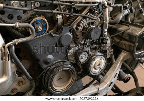 Detail of Broken belt in\
the car engine