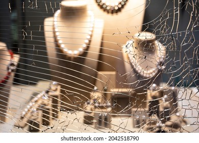 Detail Of The Broken Window Of The Jewelry Store