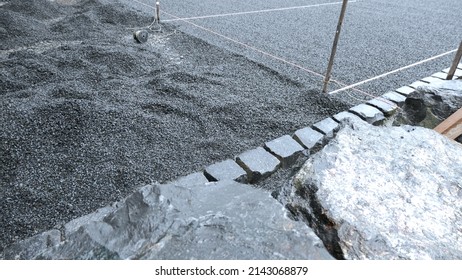 Detail Of Building Site Black In Black, Granite, Basalt And Black Grit Ready For Paving