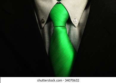 Detail Of A Business Man Suit With Green Tie