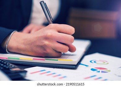 Detail Of A Businesswoman Writing Notes On Her Agenda