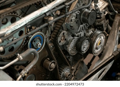 Detail Of Car Engine Timing Belt In A Workshop