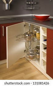 Detail Of A Circular Open Kitchen Cabinet With Cans Of Beans