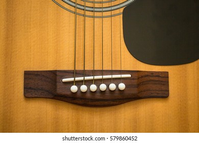 detail of classic guitar with shallow depth of field