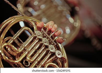 Detail Close Up Of French Horn Musical Instrument, Part Of The Brass Family Of Instruments