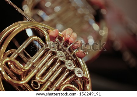 Detail close up of French Horn musical instrument, part of the Brass family of instruments