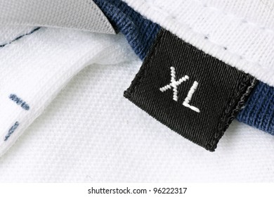 Detail of the clothing label that indicates the size XL.