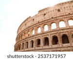 Detail of the Colosseum amphitheater in Rome with sunlight from above in Rome. Famous landmark and top travel destination