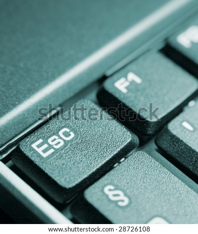 Detail of a computer keyboard focused on the escape key