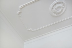 Detail Of Corner Ceiling Cornice With Intricate Crown Molding. 