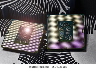 detail of cpu chip processor on aluminum heat sink cooler and lights effects