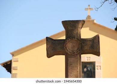 Detail of a Cross of a Church on Ester day celebration in a daylight representing the sacrifice of catholic crucifixation as a religious festival or Passion Sunday and resurrection