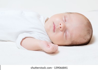 detail of cute month old baby sleeping