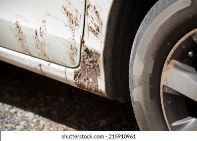 Detail Of Dirty Car With Filled Mud - Carwash Concept