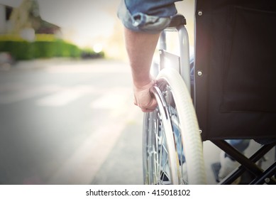 Detail Of A Disabled Man On A Wheelchair