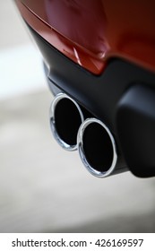 Detail of the double exhaust of a car