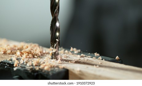 Detail Of Drill Making Hole Into Plywood, Closeup.