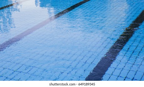 Detail Of An Empty Olympic Swimming Pool In An Outdoor Sports Center During The Winter