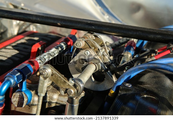 The\
detail of the engine of the historic rallye car. \

