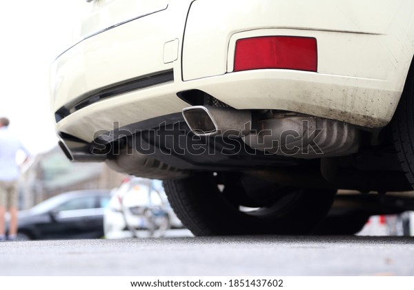 Detail of the exhaust of a\
car