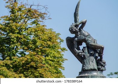 Detail Of Fallen Angel Statue In Madrid