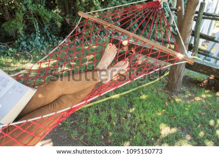 Similar – After this Photocase shock, I have to take a nap in the hammock.