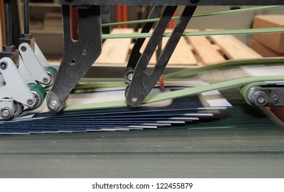 Detail Of A Folding Machine With Print Products