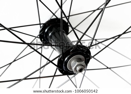 Detail of front bicycle wheel, hub and spokes