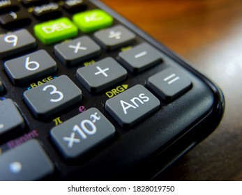 Detail of generic black scientific calculator.