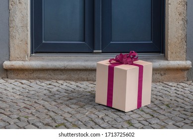 Detail Of A Gift Pack In Front Of The Door