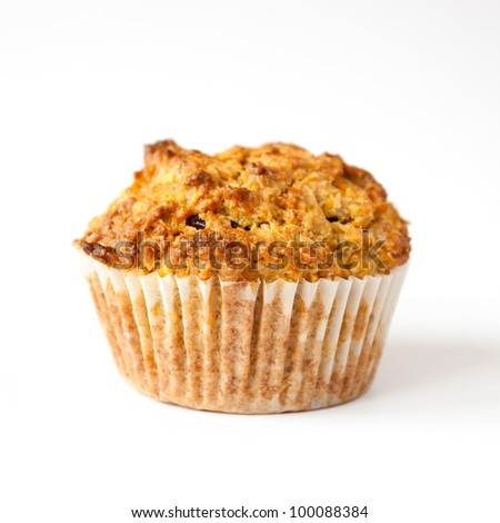 Detail of gluten free muffin with nuts isolated on white background